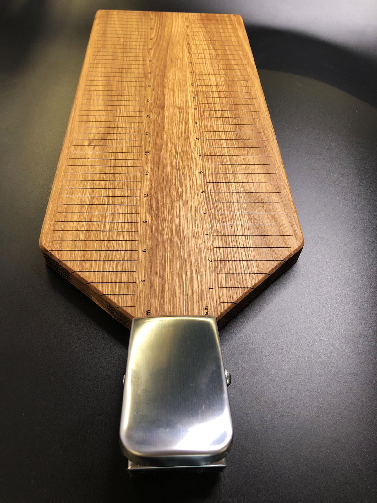 Oak cutting board for fish with clamp