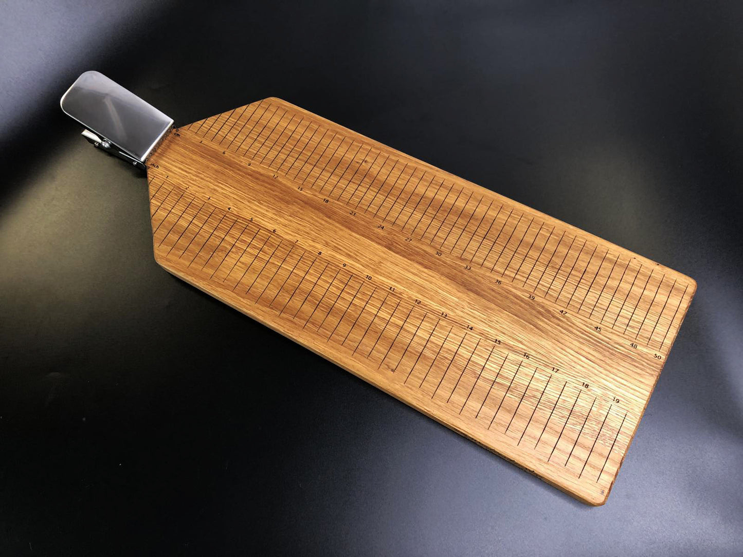 Oak cutting board for fish with clamp