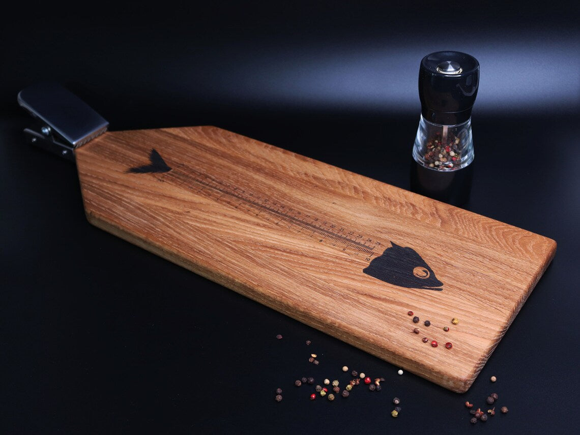 Oak cutting board for fish with clamp