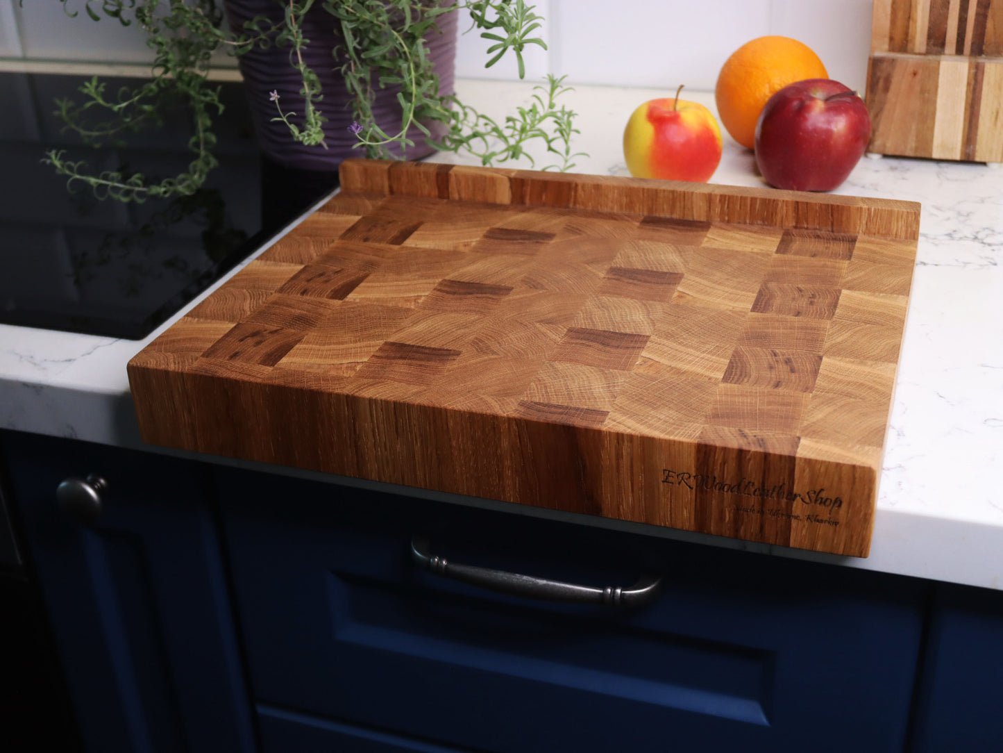 Unique end grain cutting board with double-side counter lip