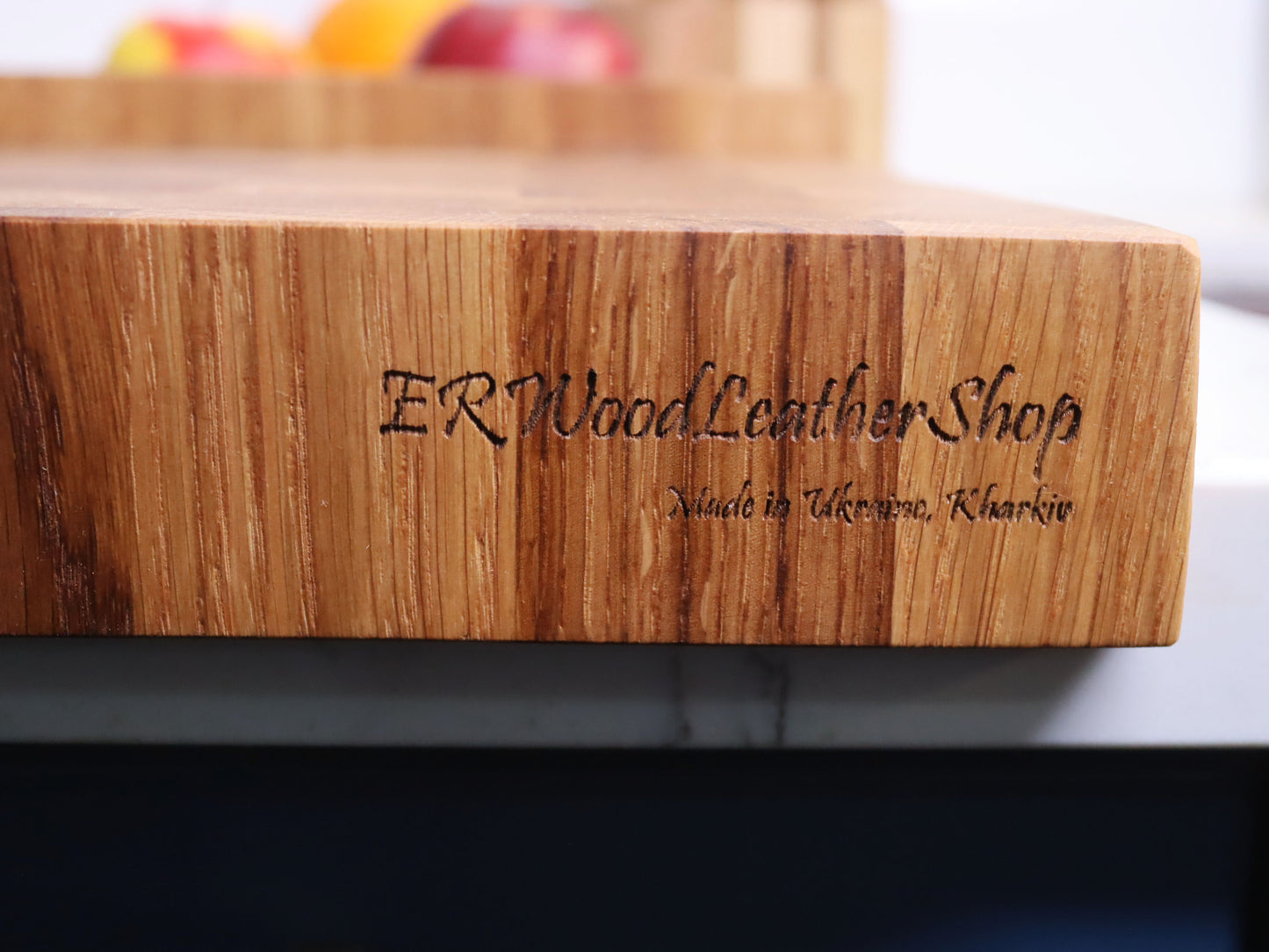 Unique end grain cutting board with double-side counter lip