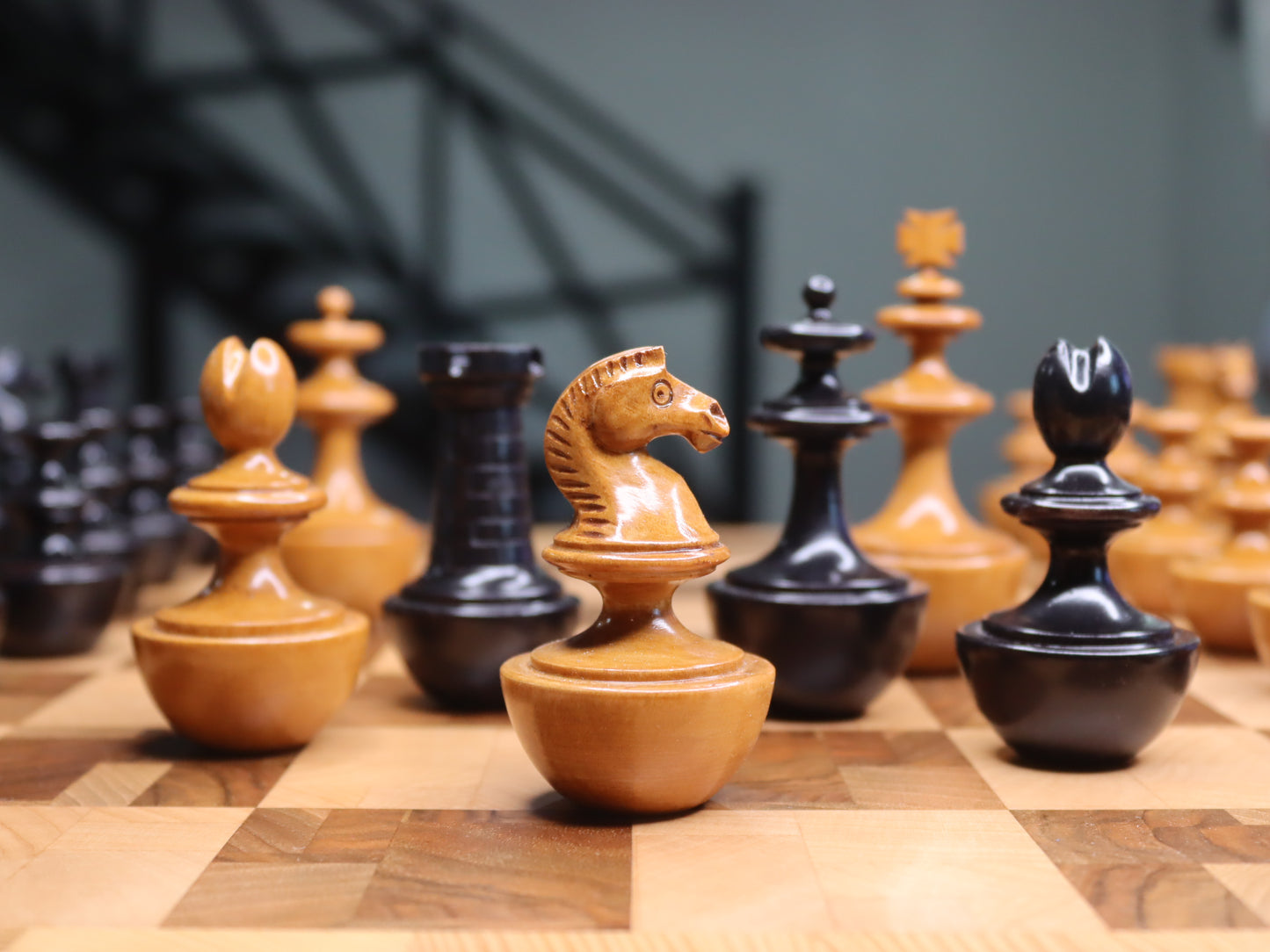 Reproduction of vintage German Schmitthenner self-righting chess set. chessmen roly-poly