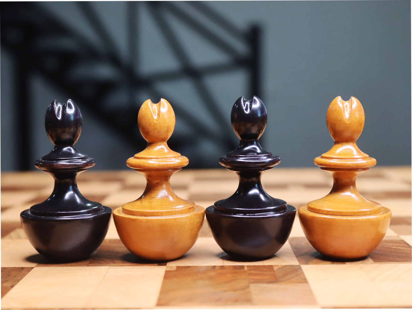 Reproduction of vintage German Schmitthenner self-righting chess set. chessmen roly-poly