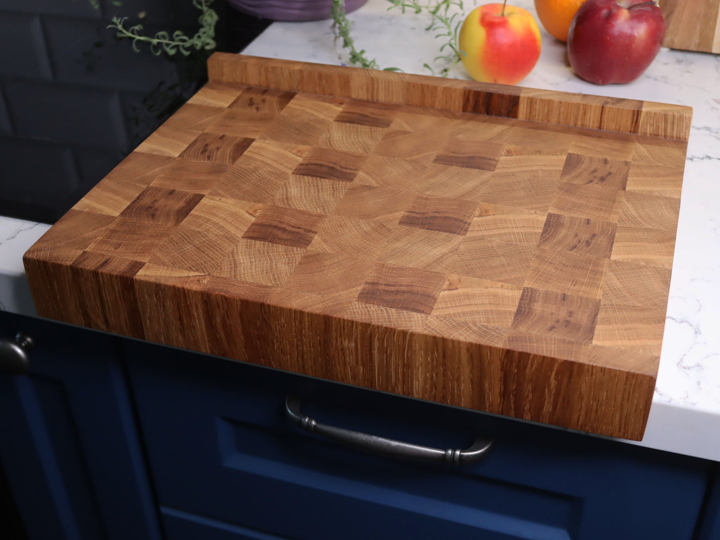 Unique end grain cutting board with double-side counter lip