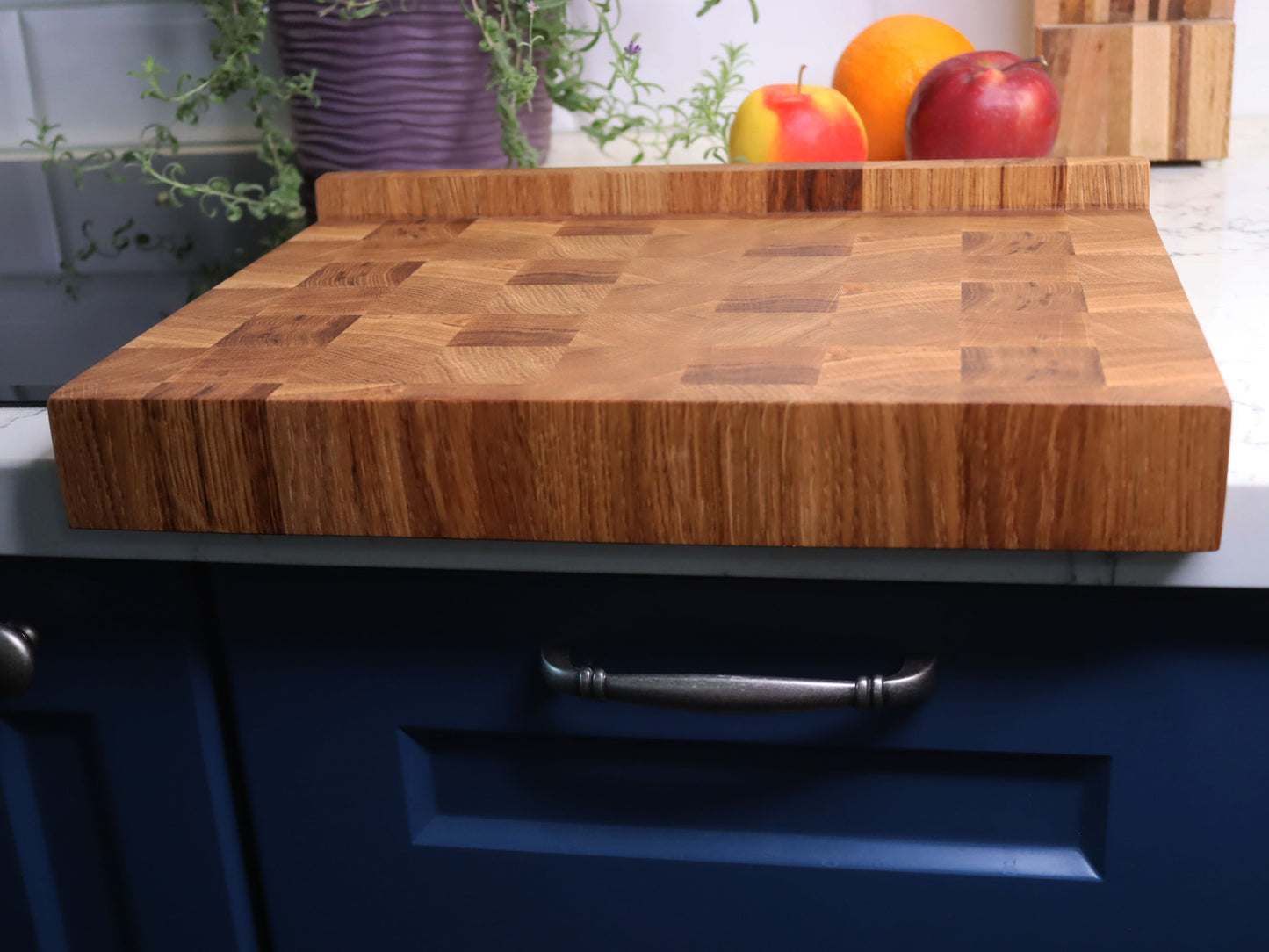 Unique end grain cutting board with double-side counter lip