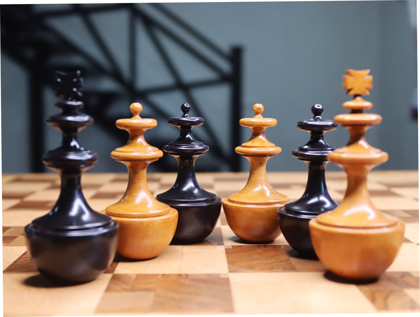 Reproduction of vintage German Schmitthenner self-righting chess set. chessmen roly-poly