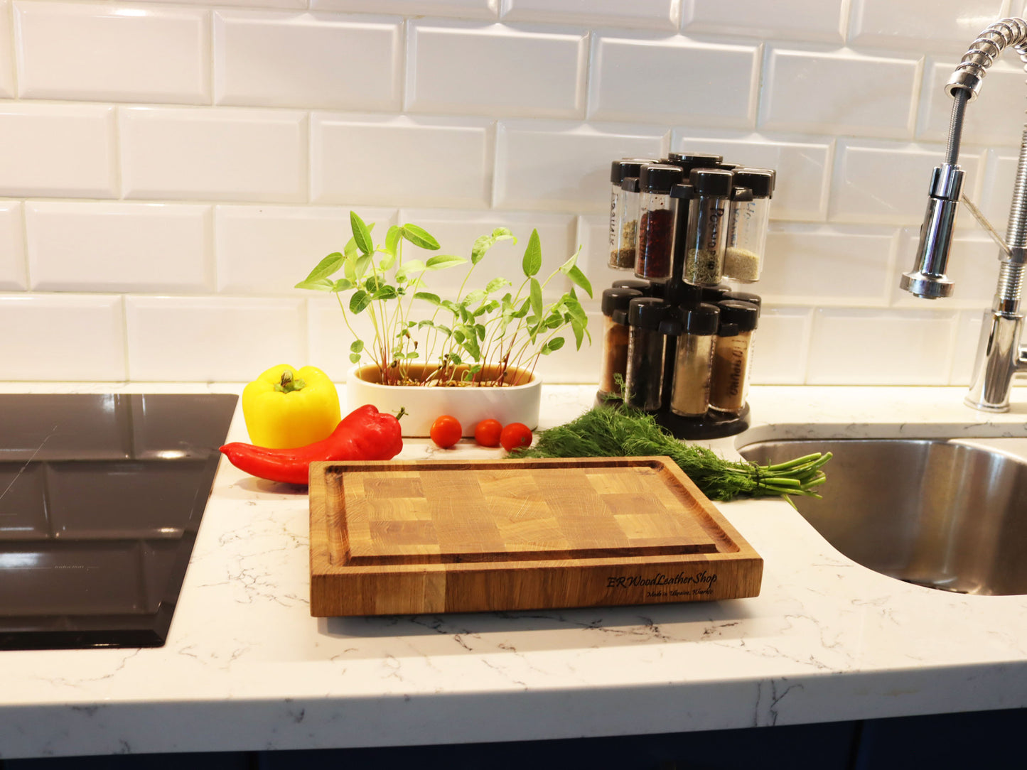 Exclusive end grain cutting board with a juice groove