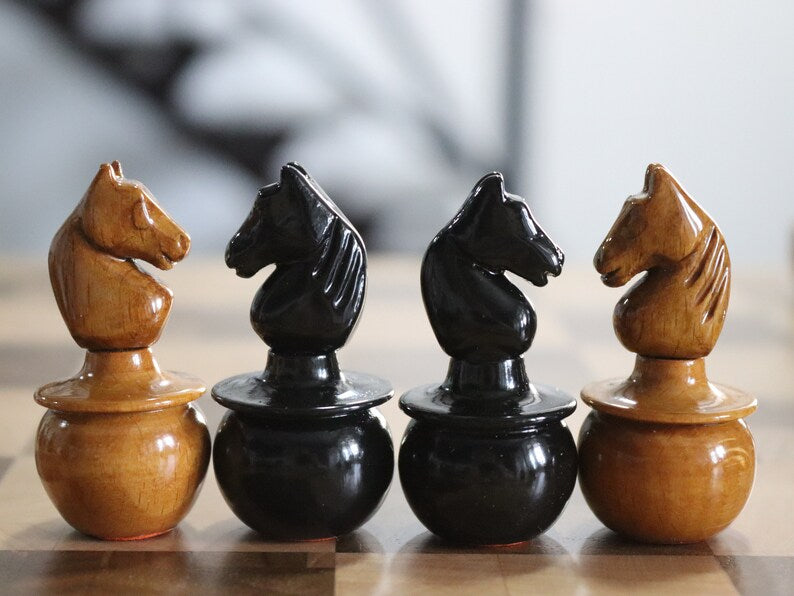 Reproduction of tsarist russia roly poly chess pieces with chessboard