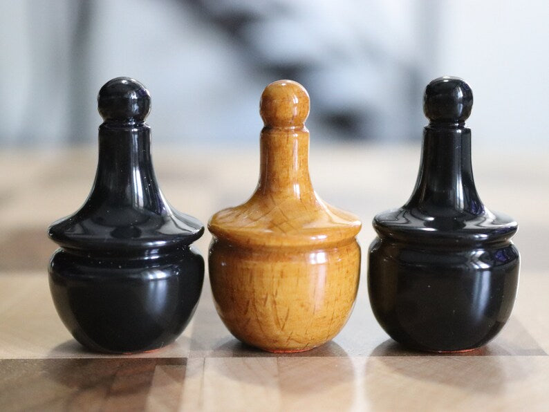 Reproduction of tsarist russia roly poly chess pieces with chessboard