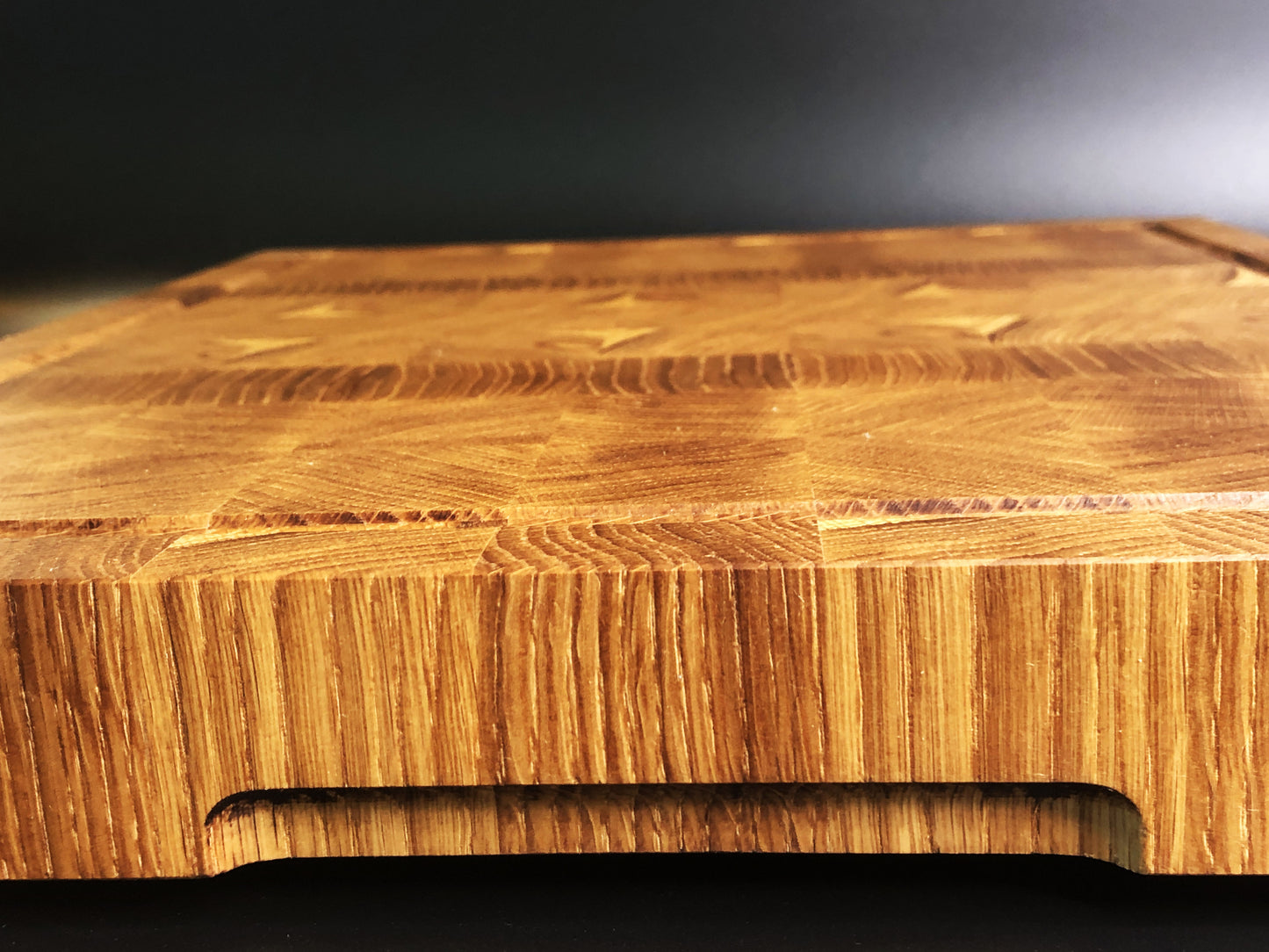 Exclusive large end grain cutting board with a juice groove